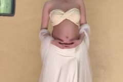 椰子晒孕照:凸起的小腹是生命的山丘